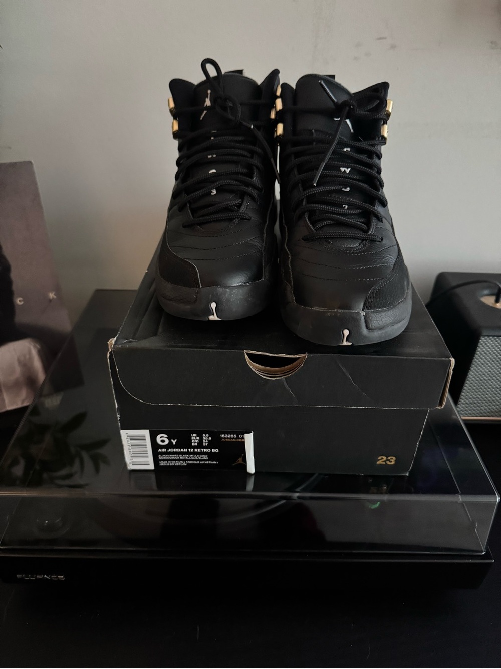 Jordan 12s Kids Black with Gold Accent High-Top Athletic Shoes